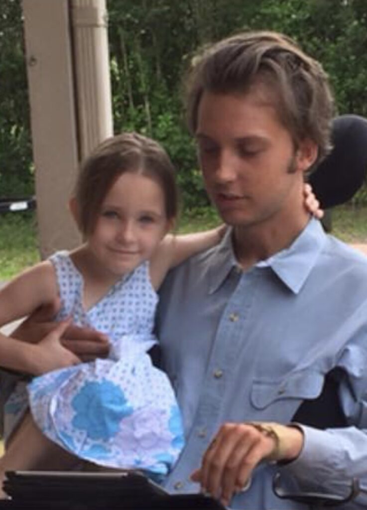 The most handsome and caring man in the world holding his younger sister